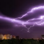 Purple lightning over city