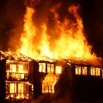 house engulfed in flames